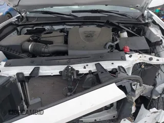 2022 Toyota Tacoma SR with VIN 3TMCZ5AN7NM470444, listed as a IAAI auction lot 41729041 with 34,248 mi miles and . Bid and sale history available at DreamBid. Image 10.