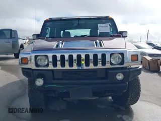 2006 Hummer H2 with VIN 5GRGN22U66H104237, listed as a IAAI auction lot 41665284 with 61,984 mi miles. Bid and sale history available at carsss.com. Image 12.