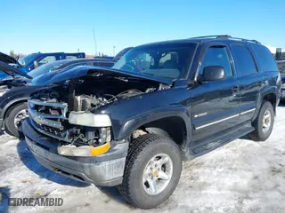 2001 Chevrolet Tahoe LS with VIN 1GNEK13T01J116989, listed as a IAAI auction lot 41871390 with 265,541 mi miles. Bid and sale history available at carsss.com. Image 2.