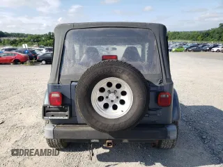 2002 Jeep Wrangler Sport с VIN 1J4FA49S02P734712, выставлен на аукционе Copart как лот 63310225 с пробегом 178 367 миль миль и Чистый • Clean title. История ставок и продаж доступна на DreamBid. Изображение 6.