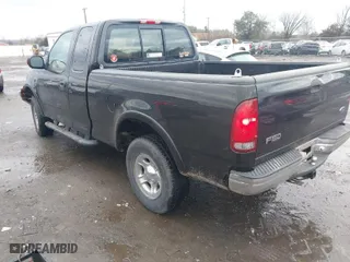 2000 Ford F-150 XL with VIN 1FTRX18W9YNA63551, listed as a IAAI auction lot 41446703 with 1 mi miles. Bid and sale history available at carsss.com. Image 3.