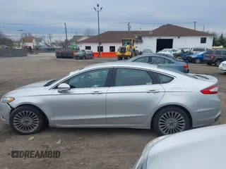 2016 Ford Fusion Titanium with VIN 3FA6P0K93GR117587, listed as a IAAI auction lot 42079701 with 142,105 mi miles. Bid and sale history available at carsss.com. Image 14.