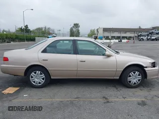 2001 Toyota Camry CE with VIN 4T1BG22K81U075758, listed as a IAAI auction lot 42024950 with 107,439 mi miles. Bid and sale history available at carsss.com. Image 13.