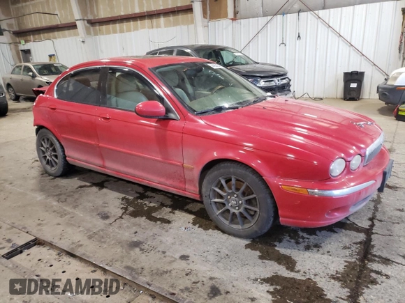 2004 Jaguar X-Type with VIN SAJEA51CX4WE15195, listed as a Copart auction lot 57868405 with 171,698 mi miles and Non Repairable. Bid and sale history available at DreamBid. Image 4.