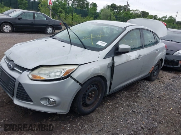 2012 Ford Focus SE with VIN 1FAHP3F29CL353872, listed as a IAAI auction lot 42528943 with Not provided miles and . Bid and sale history available at DreamBid. Image 2.