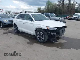2021 Audi Q5 Premium Plus z VIN WA1BAAFY5M2018717, wystawiony jako IAAI lot #41913108 z przebiegiem 79 866 mil mil oraz . Historia ofert i sprzedaży dostępna na DreamBid. Obrazek 1.