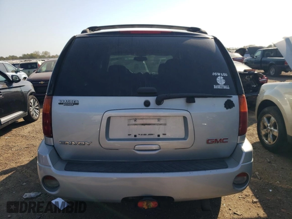 2007 GMC Envoy SLT with VIN 1GKDS13S572158514, listed as a Copart auction lot 74208144 with 209,797 mi miles and Salvage Title. Bid and sale history available at carsss.com. Image 6.