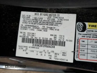 2009 Lincoln MKZ z VIN 3LNHM28T09R606344, wystawiony jako Copart lot #56650495 z przebiegiem 151 144 mil mil oraz Szkoda całkowita • Salvage title. Historia ofert i sprzedaży dostępna na DreamBid. Obrazek 12.