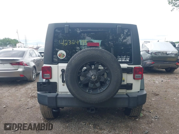 2014 Jeep Wrangler Unlimited Sport with VIN 1C4BJWDG9EL135077, listed as a IAAI auction lot 42324775 with 104,221 mi miles and . Bid and sale history available at DreamBid. Image 16.