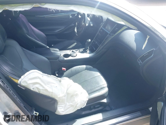 2019 Infiniti Q60 Luxe with VIN JN1EV7EL7KM290268, listed as a IAAI auction lot 42331261 with 95,402 mi miles and . Bid and sale history available at DreamBid. Image 5.