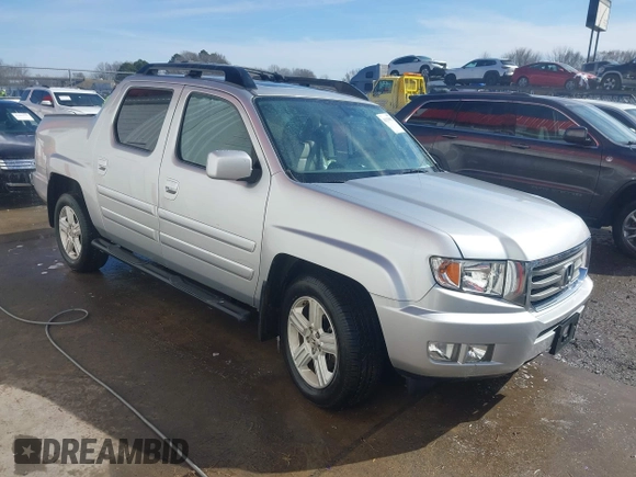 2014 Honda Ridgeline RTL z VIN 5FPYK1F51EB012843, wystawiony jako IAAI lot #41629002 z przebiegiem 114 761 mil mil oraz . Historia ofert i sprzedaży dostępna na DreamBid. Obrazek 1.