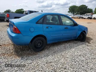 2007 Ford Focus S with VIN 1FAFP34N67W101523, listed as a Copart auction lot 56521835 with 239,505 mi miles and Salvage title. Bid and sale history available at DreamBid. Image 3.