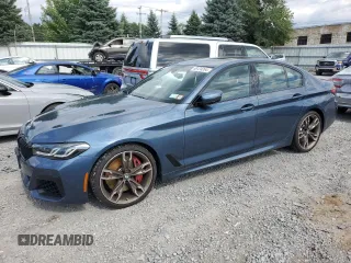 2023 BMW 5 Series M550i xDrive with VIN WBA13BK02PCN82953, listed as a Copart auction lot 68124264 with 10,010 mi miles and Salvage title. Bid and sale history available at DreamBid. Image 1.