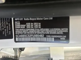 2015 Rolls-Royce Wraith with VIN SCA665C52FUX85482, listed as a Copart auction lot 77887554 with 99,781 mi miles and Salvage Title. Bid and sale history available at carsss.com. Image 10.