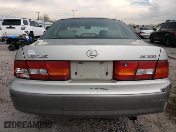 1999 Lexus ES 300 z VIN JT8BF28G3X5063996, wystawiony jako Copart lot #54093095 z przebiegiem 216 576 mil mil oraz Szkoda całkowita • Salvage title. Historia ofert i sprzedaży dostępna na DreamBid. Obrazek 6.
