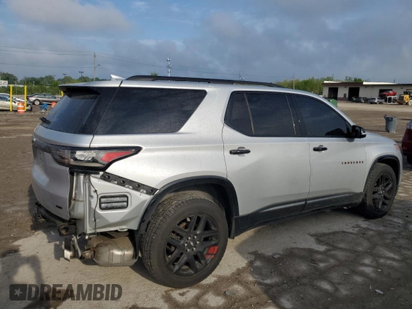 2018 Chevrolet Traverse Premier z VIN 1GNEVJKWXJJ280737, wystawiony jako Copart lot #55680005 z przebiegiem 83 098 mil mil oraz Szkoda całkowita • Salvage title. Historia ofert i sprzedaży dostępna na DreamBid. Obrazek 3.