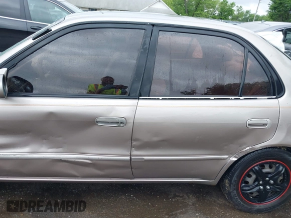 1999 Toyota Corolla VE with VIN 2T1BR12E9XC204275, listed as a IAAI auction lot 42231622 with 180,732 mi miles and . Bid and sale history available at DreamBid. Image 14.