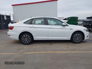 2019 Volkswagen Jetta SEL z VIN 3VWE57BU4KM248989, wystawiony jako IAAI lot #41465186 z przebiegiem 41 985 mil mil oraz . Historia ofert i sprzedaży dostępna na DreamBid. Obrazek 13.