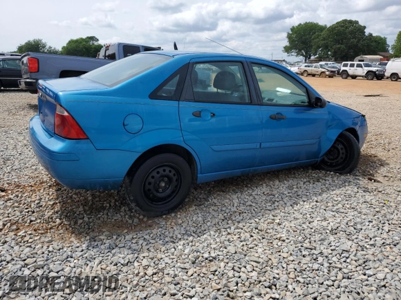2007 Ford Focus S with VIN 1FAFP34N67W101523, listed as a Copart auction lot 56521835 with 239,505 mi miles and Salvage title. Bid and sale history available at DreamBid. Image 3.