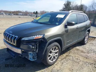 2014 Jeep Cherokee Latitude with VIN 1C4PJMCS5EW201462, listed as a IAAI auction lot 41727379 with 170,958 mi miles and . Bid and sale history available at DreamBid. Image 18.