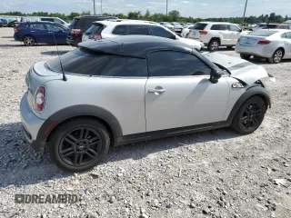 2013 MINI Coupe S z VIN WMWSX3C5XDT466209, wystawiony jako Copart lot #67072444 z przebiegiem 145 900 mil mil oraz Szkody całkowita. Historia ofert i sprzedaży dostępna na DreamBid. Obrazek 3.