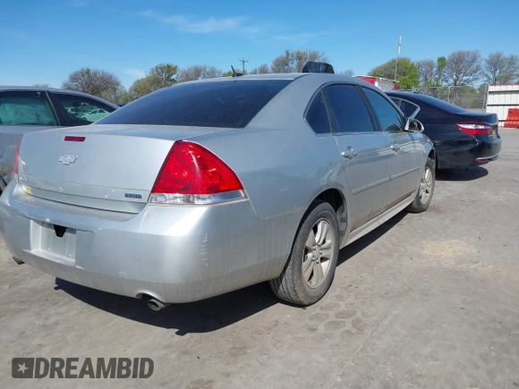 2014 Chevrolet Impala LS with VIN 2G1WA5E38E1121693, listed as a IAAI auction lot 41814213 with 129,255 mi miles and . Bid and sale history available at DreamBid. Image 4.