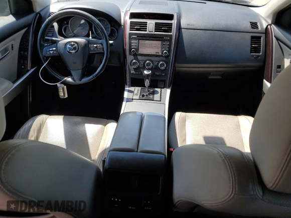 2015 Mazda CX-9 Grand Touring with VIN JM3TB3DVXF0461303, listed as a Copart auction lot 53152255 with 118,303 mi miles and Salvage Title. Bid and sale history available at carsss.com. Image 8.