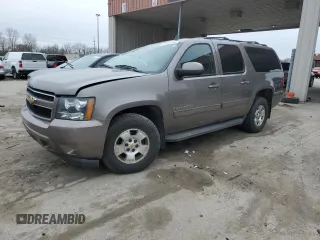 2013 Chevrolet Suburban LT with VIN 1GNSKJE72DR242862, listed as a Copart auction lot 52384365 with 163,546 mi miles and Salvage Title. Bid and sale history available at carsss.com. Image 1.