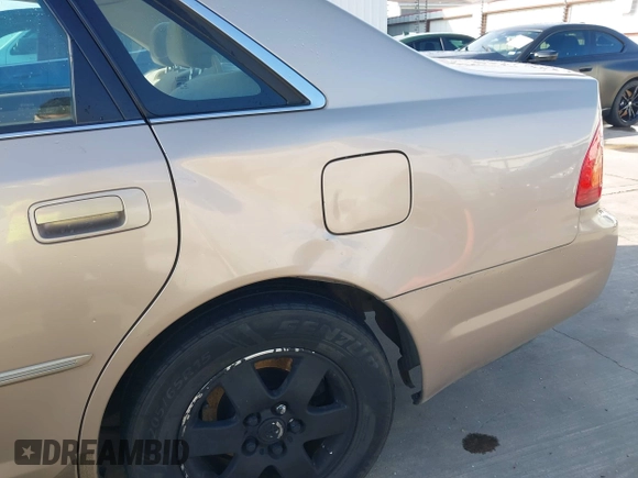 2001 Toyota Avalon XL z VIN 4T1BF28B31U185174, wystawiony jako IAAI lot #42338204 z przebiegiem 298 540 mil mil oraz . Historia ofert i sprzedaży dostępna na DreamBid. Obrazek 19.