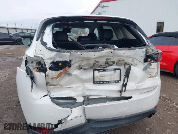 2020 Mazda CX-5 Touring with VIN JM3KFBCM6L0764982, listed as a IAAI auction lot 41632293 with 96,042 mi miles. Bid and sale history available at carsss.com. Image 6.