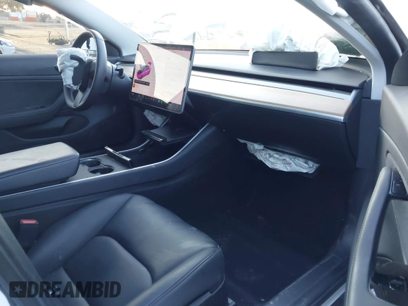 2020 Tesla Model 3 Performance with VIN 5YJ3E1EC1LF602516, listed as a IAAI auction lot 41841216 with 28,967 mi miles and . Bid and sale history available at DreamBid. Image 5.