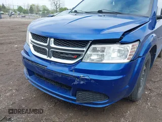 2015 Dodge Journey SE z VIN 3C4PDCAB8FT552555, wystawiony jako IAAI lot #42195398 z przebiegiem 149 503 mil mil oraz . Historia ofert i sprzedaży dostępna na DreamBid. Obrazek 6.