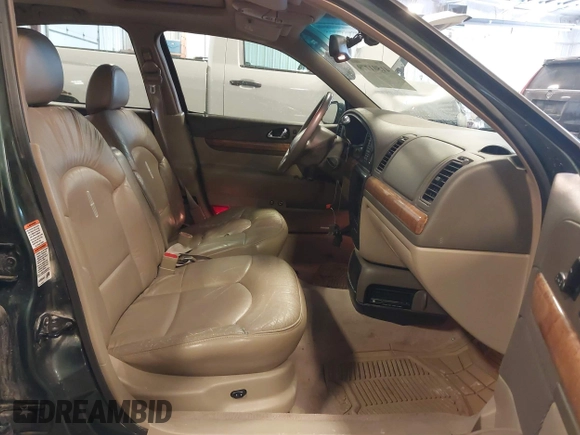 2001 Lincoln Continental with VIN 1LNHM97V11Y691910, listed as a IAAI auction lot 41501779 with 102,715 mi miles and . Bid and sale history available at DreamBid. Image 5.