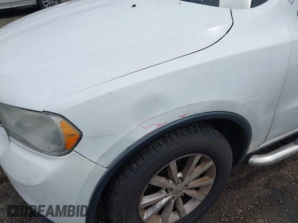 2013 Dodge Durango Crew with VIN 1C4RDJDG9DC667338, listed as a IAAI auction lot 42639559 with 137,020 mi miles and . Bid and sale history available at DreamBid. Image 17.