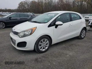 2014 Kia Rio LX with VIN KNADM5A37E6354286, listed as a Copart auction lot 79502914 with 113,826 mi miles and Salvage Title. Bid and sale history available at carsss.com. Image 1.