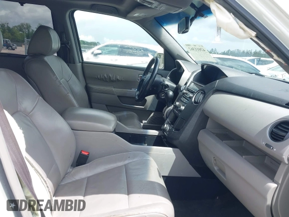 2012 Honda Pilot Touring with VIN 5FNYF3H9XCB035494, listed as a IAAI auction lot 42011362 with 271,887 mi miles and . Bid and sale history available at carsss.com. Image 5.
