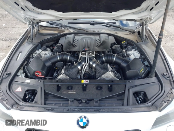 2013 BMW M5 with VIN WBSFV9C56DC772961, listed as a IAAI auction lot 41765457 with 104,568 mi miles. Bid and sale history available at carsss.com. Image 10.