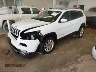2015 Jeep Cherokee Limited with VIN 1C4PJMDS2FW682142, listed as a IAAI auction lot 41399903 with 124,918 mi miles and . Bid and sale history available at DreamBid. Image 19.