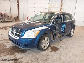 2009 Dodge Caliber SXT with VIN 1B3HB48A69D199516, listed as a IAAI auction lot 41562175 with 193,923 mi miles. Bid and sale history available at carsss.com. Image 17.