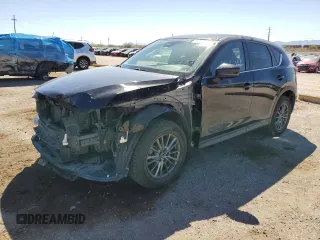 2017 Mazda CX-5 Touring z VIN JM3KFBCL4H0184922, wystawiony jako Copart lot #50166195 z przebiegiem 86 270 mil mil oraz Szkody całkowita. Historia ofert i sprzedaży dostępna na DreamBid. Obrazek 1.