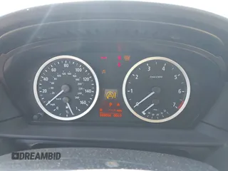2005 BMW 5 Series 525i with VIN WBANA53565B859447, listed as a IAAI auction lot 41663950 with 99,064 mi miles. Bid and sale history available at carsss.com. Image 7.