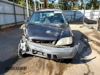 1999 Honda CR-V LX with VIN JHLRD2847XC021888, listed as a Copart auction lot 76556164 with 285,517 mi miles and Salvage Title. Bid and sale history available at carsss.com. Image 5.
