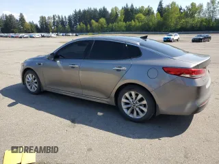 2016 Kia Optima EX with VIN 5XXGU4L30GG104013, listed as a Copart auction lot 54220105 with 120,073 mi miles and Salvage Title. Bid and sale history available at carsss.com. Image 2.