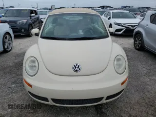2006 Volkswagen Beetle z VIN 3VWPF31Y06M309862, wystawiony jako Copart lot #76907554 z przebiegiem Nie podano mil oraz Szkoda całkowita • Salvage title. Historia ofert i sprzedaży dostępna na DreamBid. Obrazek 5.