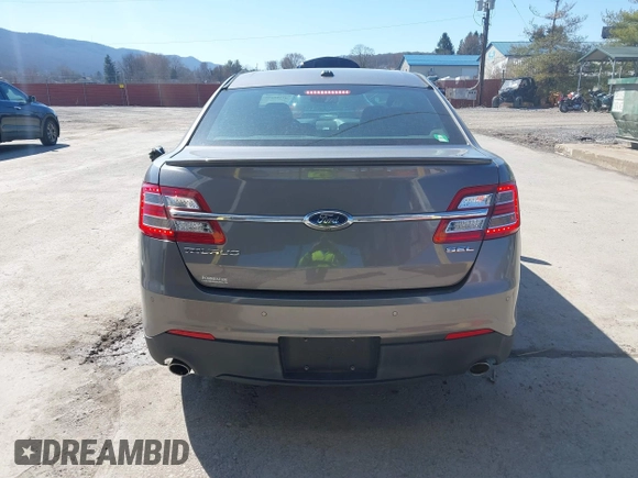 2014 Ford Taurus SEL with VIN 1FAHP2E82EG162676, listed as a IAAI auction lot 41795220 with 125,491 mi miles. Bid and sale history available at carsss.com. Image 17.