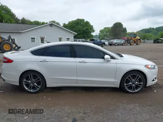 2014 Ford Fusion Titanium с VIN 3FA6P0K97ER352345, выставлен на аукционе IAAI как лот 42370970 с пробегом 182 895 миль миль и . История ставок и продаж доступна на DreamBid. Изображение 13.
