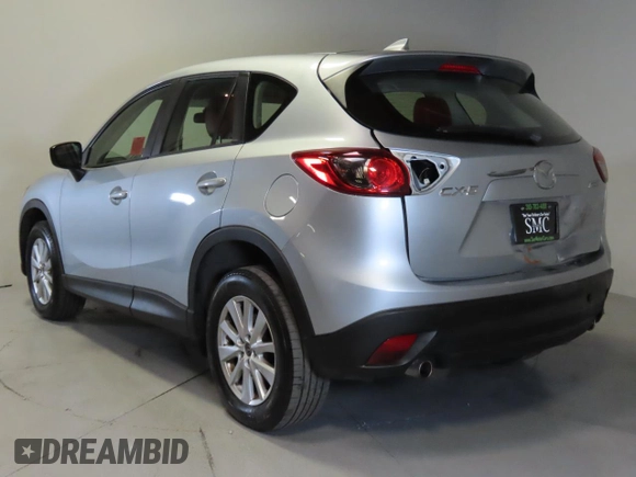 2016 Mazda CX-5 Sport with VIN JM3KE2BEXG0904597, listed as a Copart auction lot 42407975 with 63,343 mi miles and Salvage Title. Bid and sale history available at carsss.com. Image 4.