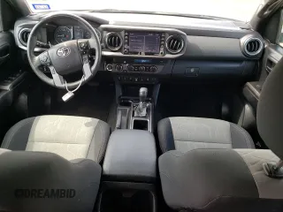 2021 Toyota Tacoma SR z VIN 5TFCZ5AN7MX272231, wystawiony jako Copart lot #52739255 z przebiegiem 67 414 mil mil oraz Szkoda całkowita • Salvage title. Historia ofert i sprzedaży dostępna na DreamBid. Obrazek 8.