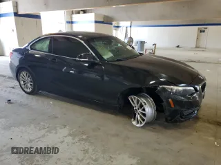 2015 BMW 2 Series 228i xDrive with VIN WBA1G9C51FVX96763, listed as a Copart auction lot 69091454 with 100,816 mi miles and Salvage Title. Bid and sale history available at DreamBid. Image 4.