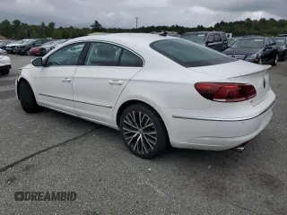2014 Volkswagen CC VR6 Executive 4Motion with VIN WVWGU7AN2EE523987, listed as a Copart auction lot 71685214 with 77,732 mi miles and Salvage Title. Bid and sale history available at carsss.com. Image 2.